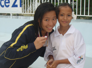 grace loh with medal girl photo hmg.jpg